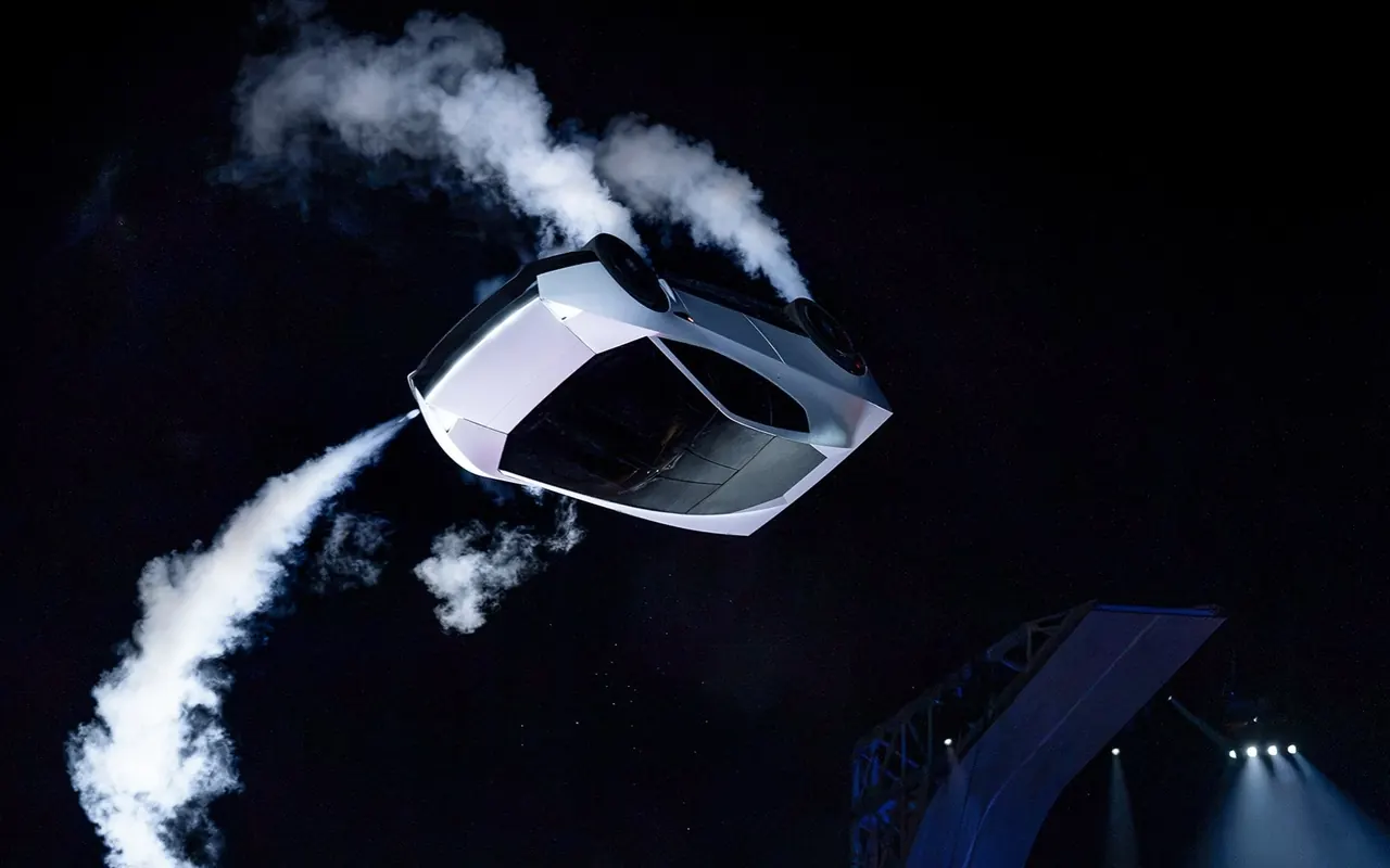 Tesla Roadster de cabeça para baixo Tesla Roadster de cabeça para baixo no ar, com jatos de gás frio, durante a apresentação